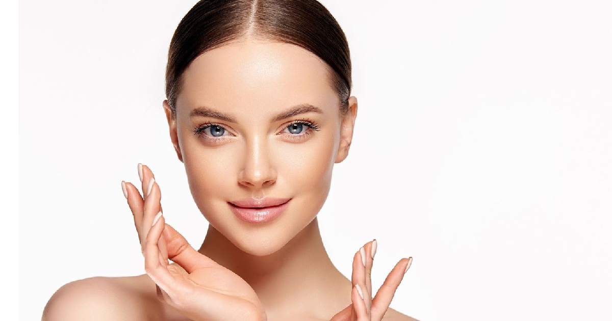 Woman showing smooth, defined jawline and glowing skin after Kybella in Riverside, CA